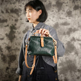 Bolsos de mano de piel de vaca curtida vegetal